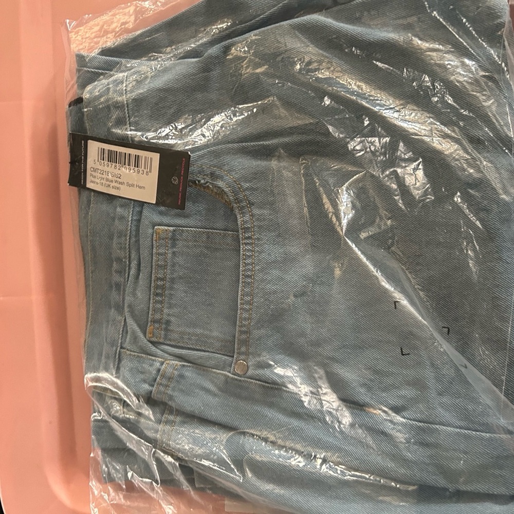 Fashion Nova light blue denim pants , size 18, new with tags !